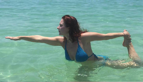 waterfront yogo-facing left Yoga Session Leader in the Water